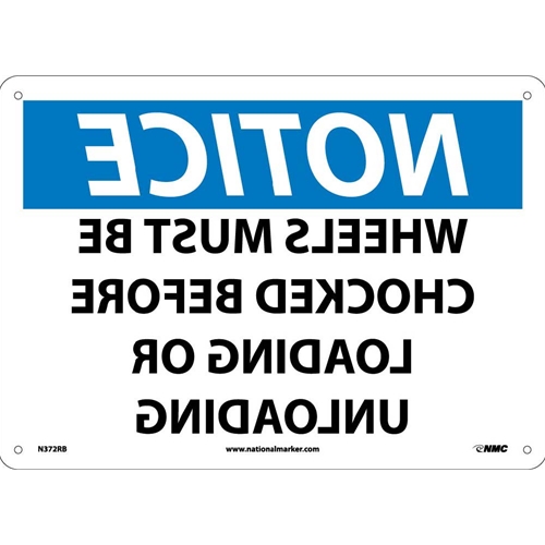Notice Wheels Must Be Chocked Sign (N372RB)